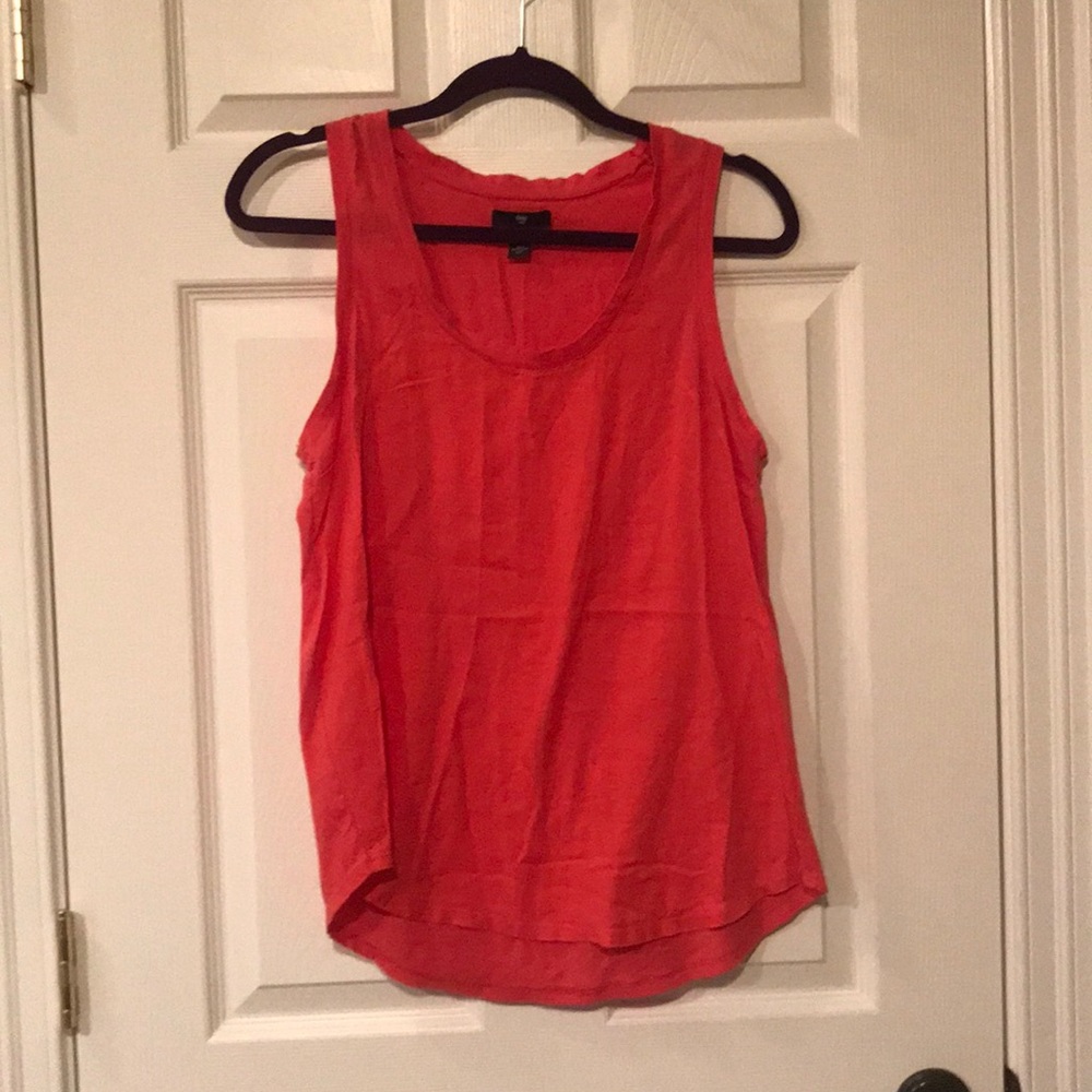 Orange tank top.